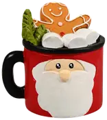 Festiv rød krus med julemandens ansigt, sort hank, pyntet med skumfiduser, grønne blade og en smilende honningkagemand. Perfekt til juledekoration eller gave. Keramisk materiale.