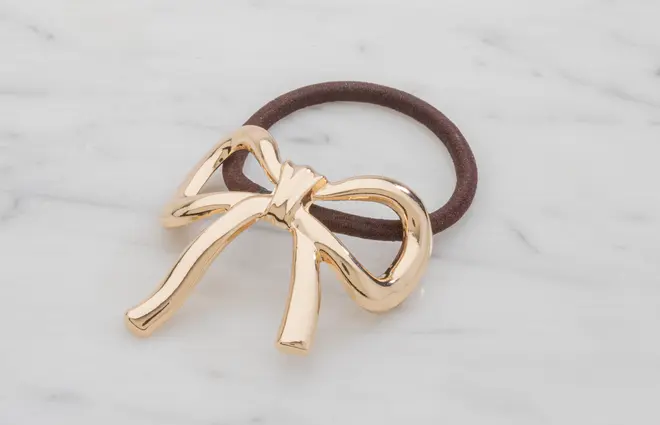 Hårsnodd med rosett - guld