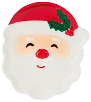 Keramiktallrik formad som jultomtens ansikte med röd mössa, järnek, rosiga kinder och leende. Festlig design, perfekt för servering eller dekoration vid jul.