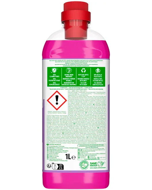 1-liters flaske med pink rengøringsmiddel, rød låg, grøn miljøvenlig etiket, advarselsikon og produktinformation. Indeholder naturlige ingredienser og genanvendelig emballage.
