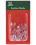 Förpackning med genomskinliga sugproppar och metallkrokar för upphängning av dekorationer. Levereras på röd och grön bakgrund med texten 'Merry Christmas Suction Hooks.'