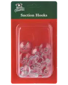 Förpackning med genomskinliga sugproppar och metallkrokar för upphängning av dekorationer. Levereras på röd och grön bakgrund med texten 'Merry Christmas Suction Hooks.'