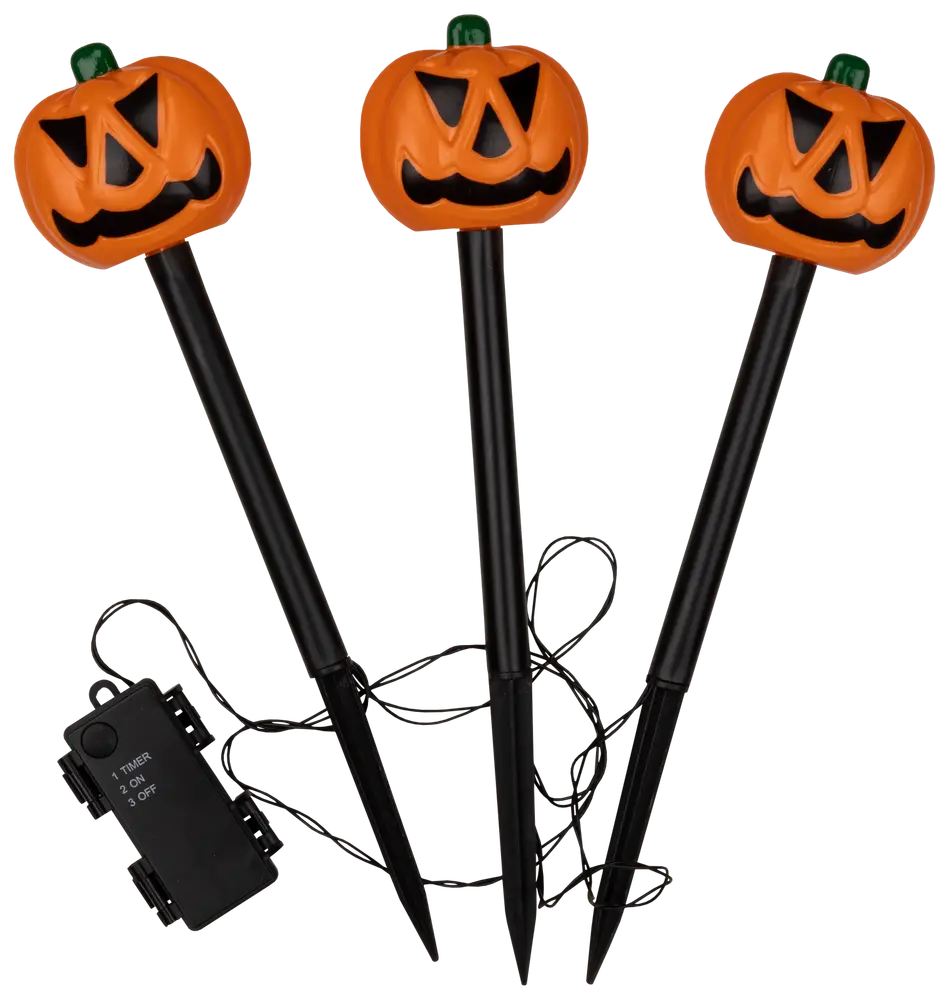 Halloweenpumpor på spjut