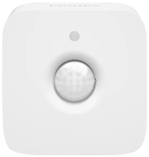 Hvid, firkantet Philips bevægelsessensor med afrundede hjørner, centralt kuppelformet sensor og lille cirkulær indikator ovenover. Kompakt design til smart home-automatisering.