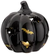 Blank svart keramisk pumpa med fladdermusformade utskärningar och gulddetaljer. Dekorativ Halloweenlykta där ljuset lyser genom utskärningarna.