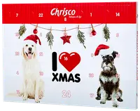 Adventskalender för hundar med två hundar i tomteluvor, numrerade luckor, juldekorationer och texten "I love Xmas". Innehåller dagliga godsaker till husdjur.