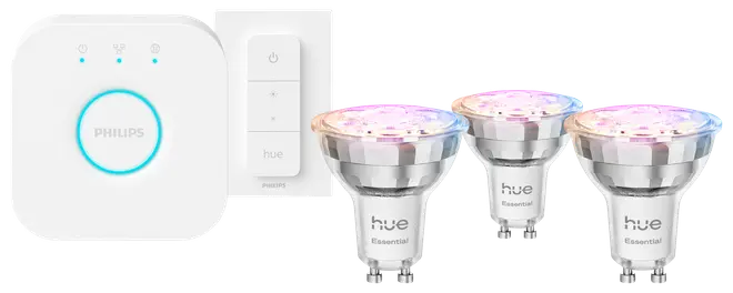 Philips Hue Essential smart belysningssæt med tre GU10 farveskiftende pærer, trådløs dæmperkontakt og bridge hub til app- og stemmestyring.