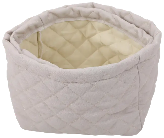 Quiltad tygförvaringskorg i ljusbeige, rund form med mjuka sidor och diamantmönster. Rymlig insida, perfekt för organisering av hushållsartiklar, leksaker eller tvätt.