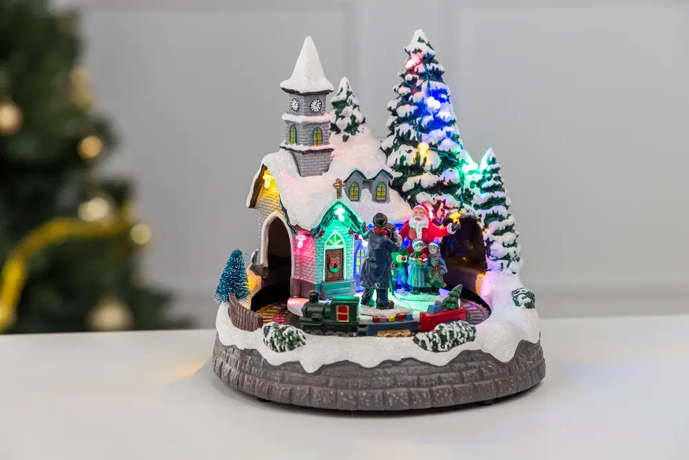 Jullandskap tåg och jultomte