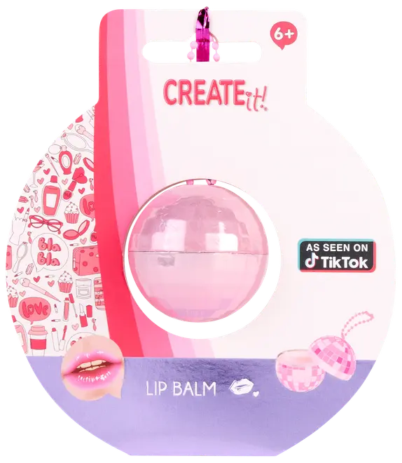 Kugleformet lyserød læbepomade i klar plastbeholder, pakket på farverigt kort med dekorationer. Velegnet til børn fra 6 år. Markedsført som set på TikTok.