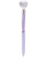 A ballpoint pen with a light purple barrel and a transparent upper section filled with sparkling purple crystals. The pen is topped with a large, clear heart-shaped gem, giving it a decorative and elegant appearance.