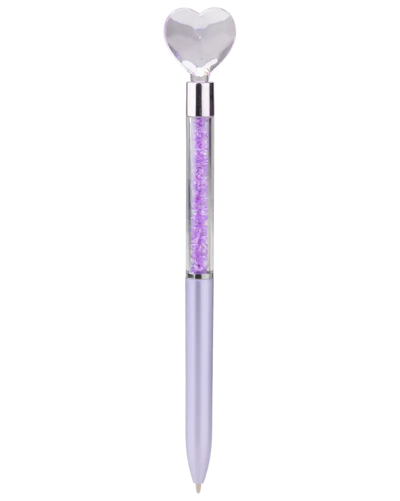 A ballpoint pen with a light purple barrel and a transparent upper section filled with sparkling purple crystals. The pen is topped with a large, clear heart-shaped gem, giving it a decorative and elegant appearance.