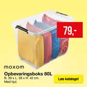 Gennemsigtig opbevaringskasse med farverige puder i.
