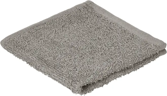 Gråt vaskeklud lavet af blødt, absorberende frotté bomuld. Kvadratisk form med pænt afsluttede kanter, velegnet til daglig brug i badeværelse eller køkken. Maskinvaskbar og holdbar.