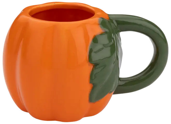 Keramikkopp formad som en pumpa, orange kropp med grönt handtag som liknar ett blad. Blank yta, rundad design, perfekt för höst eller Halloween.