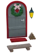Miniature juledekoration med grå dør, rød ramme, krans, velkomstmåtte, lanterne, brænde og bænk. Perfekt til festlig udsmykning og nissedør installationer.