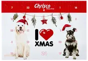 Julekalender til hunde med to hunde iført nissehuer, julepynt og nummererede låger til daglige godbidder. Perfekt til nedtælling til jul, fra Chrisco, festligt design.
