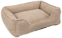 Rektangulær beige kæledyrsseng med hævede sider og blødt, tekstureret stof. Komfortabel støtte til kæledyr. Passer til små og mellemstore hunde eller katte. Aftagelig pude for nem rengøring.