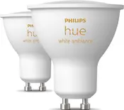 Sæt med to Philips Hue White Ambiance GU10 LED-pærer, hvid finish, justerbar hvidt lys, energieffektive, til smart belysning, kompatible med app- og stemmestyring.
