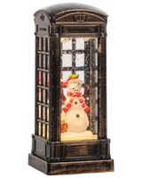 Snögubbe i telefonkiosk 