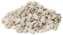 Bunke af små, uregelmæssigt formede hvide og lysegrå sten, velegnet til haveanlæg, dekoration eller dræning. Stenene varierer i størrelse og tekstur.