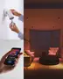 Smart LED-pære til loftslamper, app-styret, justerbar farve og lysstyrke, velegnet til moderne stuer. Nem installation og fjernbetjening via smartphone-app.