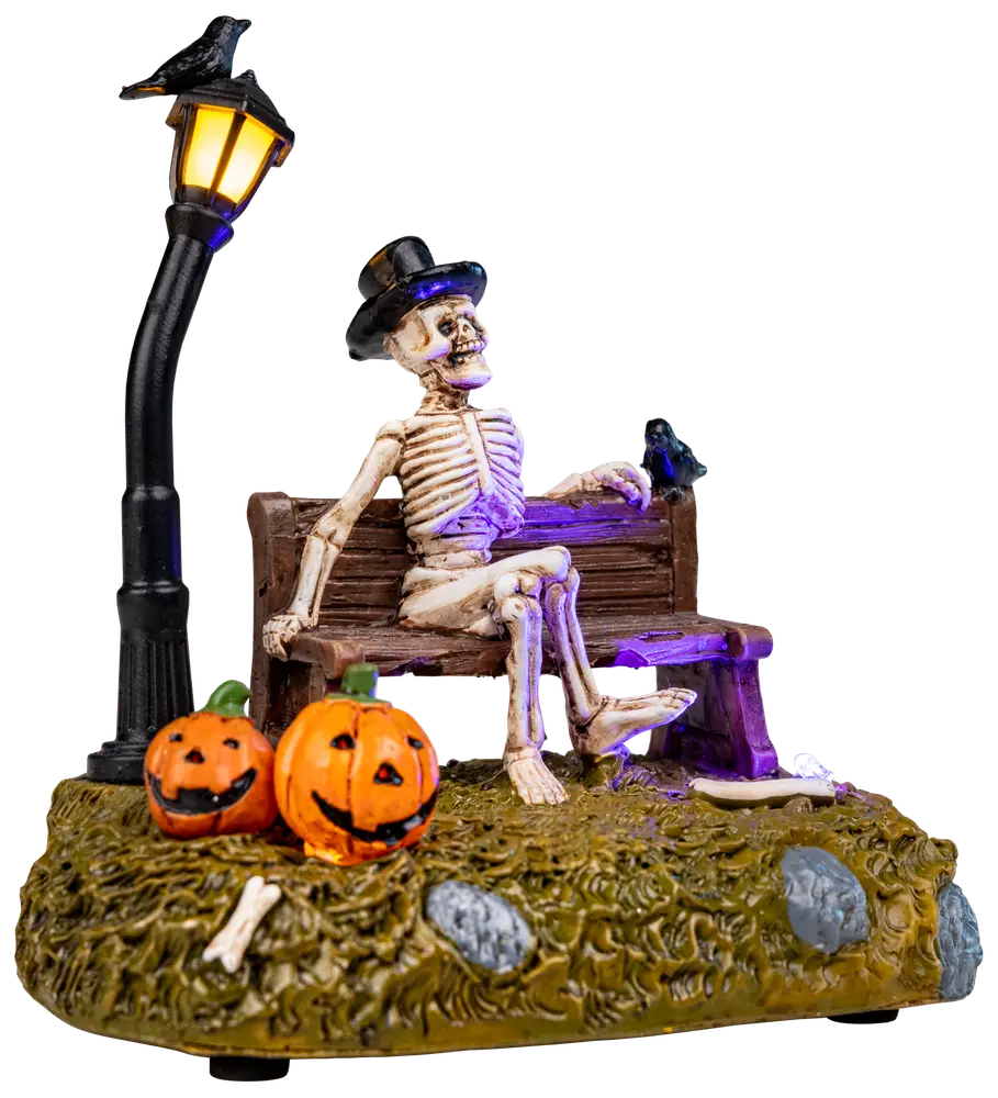 Halloween skelett på bänk