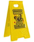 Gult plast advarselsskilt med teksten: 'Danger Zombies Outbreak Leave This Area', zombie-grafik og blodpletter. Sammenklappeligt design med bærehåndtag.