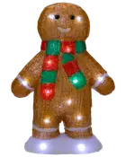 Upplyst pepparkaksgubbe med röd och grön halsduk, leende ansikte och vita detaljer på händer och fötter. Passar till juldekoration.