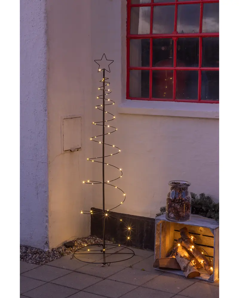 Metallisk spiraljulgran med varmvita LED-lampor och stjärna på toppen. Minimalistisk design, står på rund bas, för inomhus- eller utomhusbruk, elanslutning krävs.
