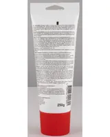 A white plastic tube with a large red ribbed screw cap, featuring a hanging slot at the top. The back of the tube is covered with detailed product information, instructions, and warnings in black text. The tube contains 250 grams of product, as indicated near the bottom, and includes a barcode and manufacturer details.