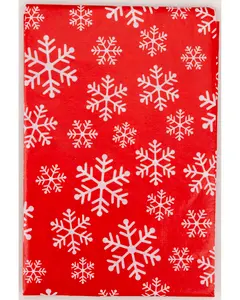 Rött presentpapper med ett festligt mönster av vita snöflingor i olika storlekar. Perfekt för julklappar. Slät, glansig yta förhöjer det färgstarka motivet.