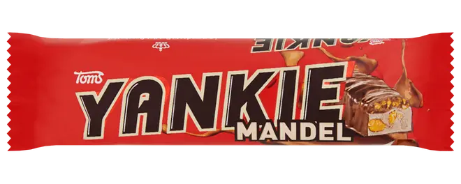 Rød Toms Yankie Mandel chokoladebarpakning med stort logo og mandelstykker.