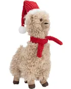 Blød lama med krøllet beige pels, iført rød nissehue og matchende tørklæde.