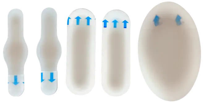 Sæt med fem hvide plast ortodontiske voksapplikatorer med blå pile, designet til nem påføring og fjernelse af voks på tandbøjler eller apparater.