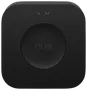 Sort, firkantet smart home-hub med afrundede hjørner, central cirkulær knap med 'hue', to små indikatorlys øverst. Minimalistisk design til styring af smart belysning.