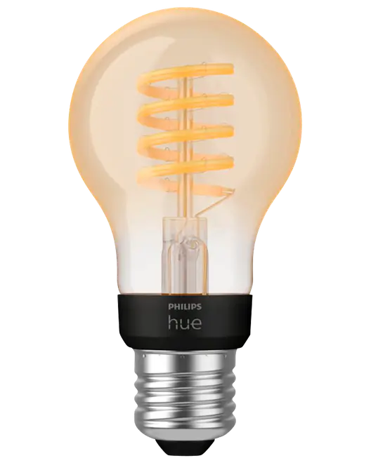 Philips Hue smartpære med klart glas, spiralfilament, varm ravfarvet glød og skruelampefatning.