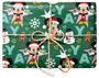 Inslagen present i grönt Disney-julpapper med Musse Pigg, snöflingor, stjärnor och snörrosett.