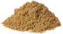 En bunke fintmalet, lysebrunt pulver, sandsynligvis et krydderi som stødt spidskommen, med blød, smuldrende konsistens til krydring og madlavning.