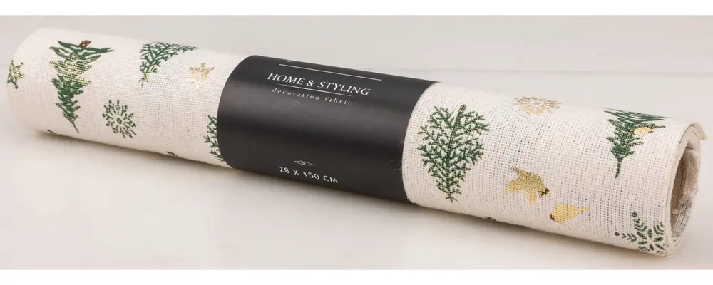 Rullad dekorationsväv, 28x150 cm, offwhite med gröna och gyllene botaniska tryck. Passar till bordsdukning, dekoration eller pyssel. Texturerat material med naturinspirerat motiv.