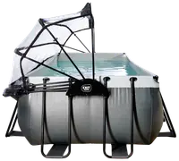 Rektangulær fritstående pool med solid metalramme, grå ydre, klart vand og stor justerbar gennemsigtig baldakin til skygge. Inkluderer stige. Mærke: EXIT Toys.