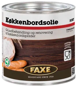 FAXE køkkenbordsolie, sort, til grundbehandling og renovering af køkkenbordsplader. Fødevarekontakt godkendt. Metal dåse med skruelåg, træpleje siden 1926.