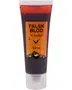 Tube med falsk blod til huden, 50 ml. Mørkerød væske i klar plasttube med orange Halloween-etiket med flagermus, edderkoppespind og græskar.