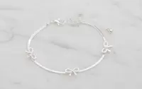 Armband med rosetter - silver