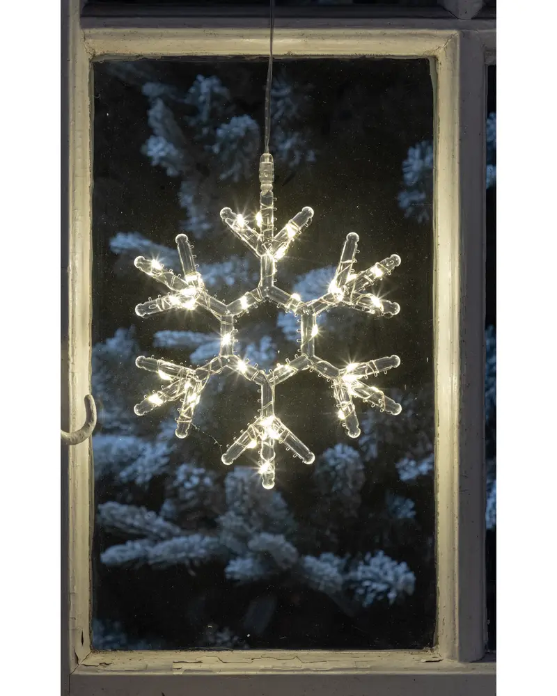 A decorative snowflake-shaped light made from clear plastic tubing with integrated warm white LED bulbs. The snowflake has six symmetrical branches and is suspended by a transparent cord, designed for hanging in a window. The lights emit a soft, festive glow, ideal for holiday or winter-themed decor.