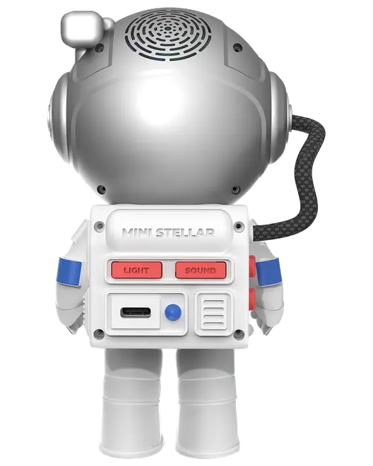Legetøjsastronaut med sølvhjelm, kontrolpanel bagpå mærket 'MINI STELLAR', røde knapper til lys og lyd, opladningsport og fleksibel sort slange.
