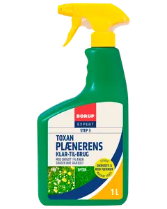 Grøn 1-liters sprayflaske med gul sprayhoved, mærket 'Borup Expert Toxan Plænerens.' Klar-til-brug ukrudtsfjerner til plæner, skader ikke græsset.