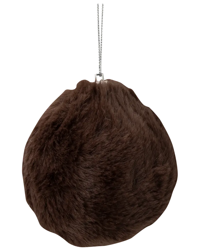 Rund, brun nyckelring med fuskpäls och silverfärgad ögla. Mjuk, fluffig känsla, perfekt för väskor, nycklar eller ryggsäckar. Ungefär handstor.