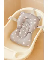 Mjuk badkudde för baby med stjärnmönster och björnöron, ger komfort och stöd. Passar i babybadkar och fästs med justerbara remmar för säker badning.