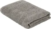 Vikt grå badhandduk i mjuk, absorberande bomullsfrotté. Enkel design med färdiga kanter, passar för dagligt bruk i badrum. Ger komfort och hållbarhet.